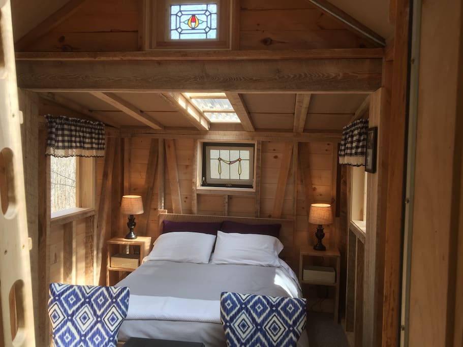 The cozy sleeping area and loft comfortably sleeps 2-3
