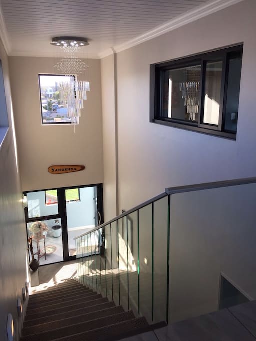 Stairs down to entrance of the home