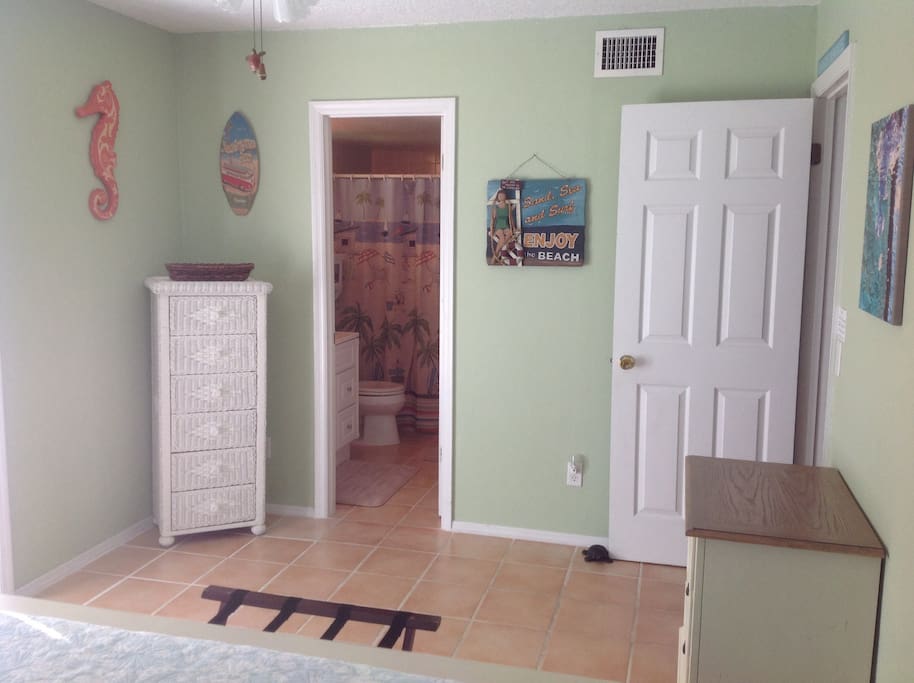 Opposite view of bedroom showing bathroom right off bedroom
