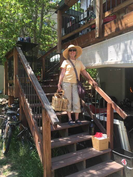 Staircase of private porch leading to front door. Downstairs neighbor lives below. That's my mom when she was visiting. :)