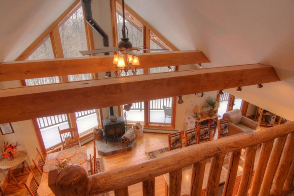 Warm up next to the cast iron stove, or enjoy views from the massive wrap around deck.