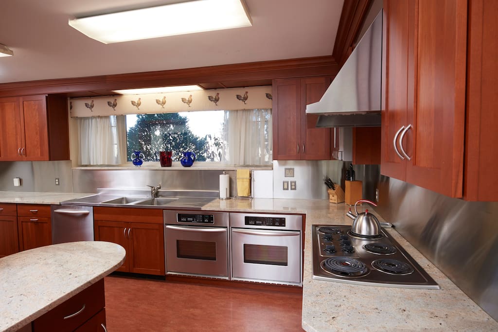 The kitchen is newly renovated with multiple ovens, a dishwasher and built in ice machine.