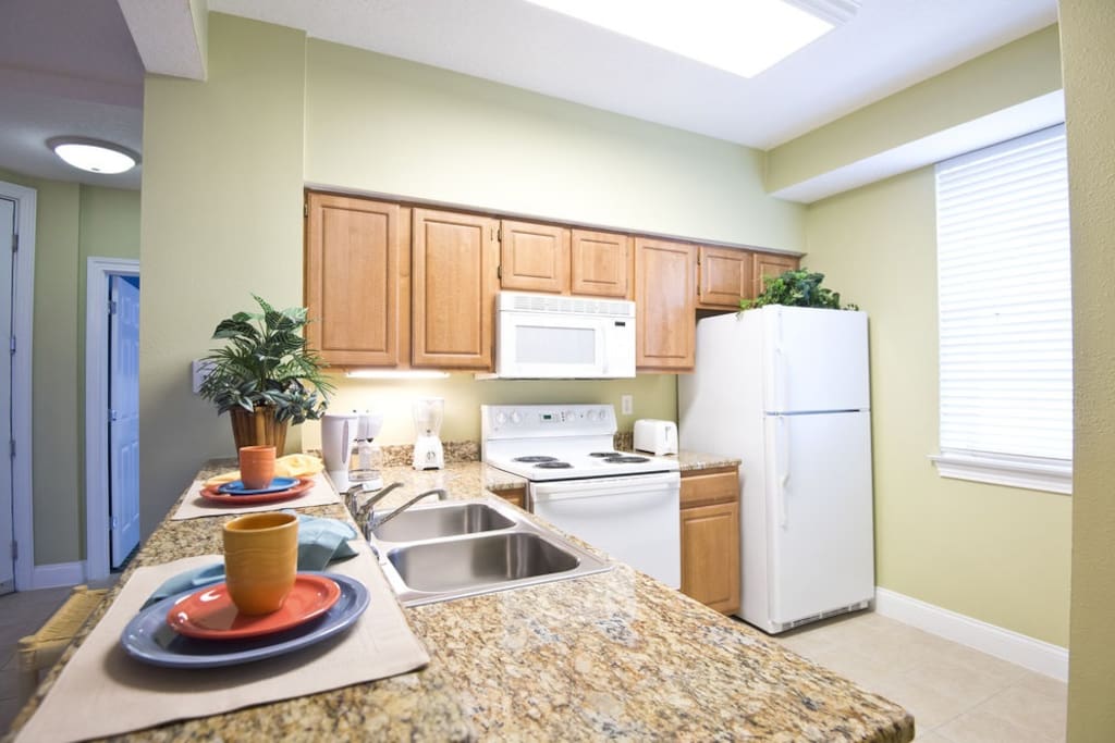 Kitchen
Kitchen with refrigerator, microwave, dishwasher, and coffee/tea maker