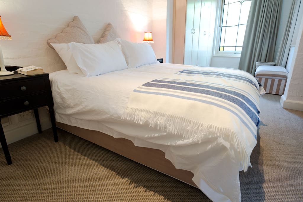 Main Bedroom. Built in cupboards and dressing dressing area adjoining room.