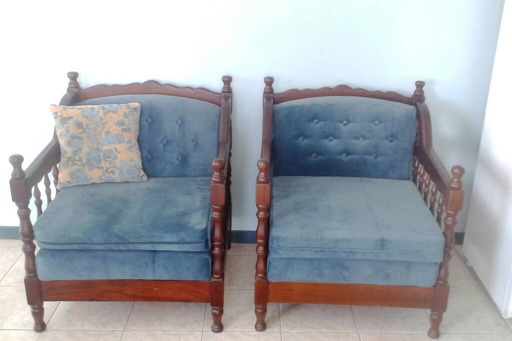 How about some TV watching in comfortable upholstered velvet chairs?
