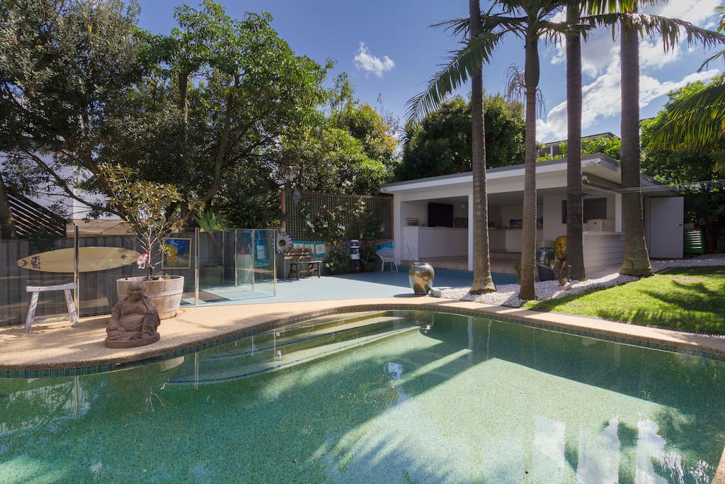 Pool and cabana from backyard