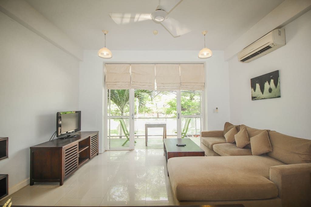 Living room with Central river view balcony