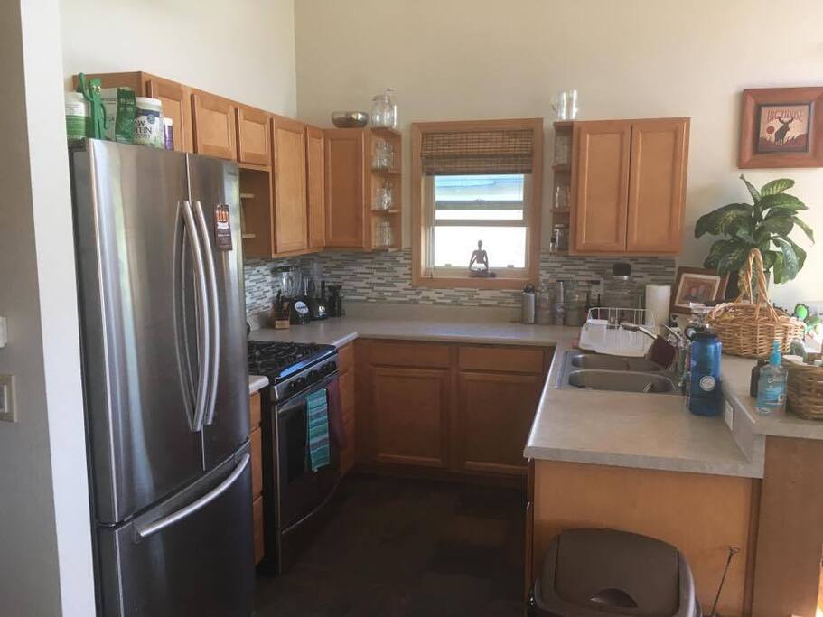 Kitchen, open floor plan leads into the living space, so you can socialize as you cook, or make another cocktail.