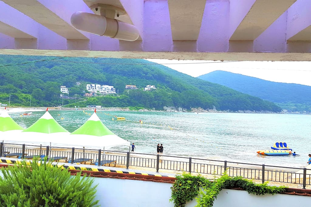 Beach House Veranda and Garden. Right on Wahyeon Beach with awesome views. Only a few feet from the beach.