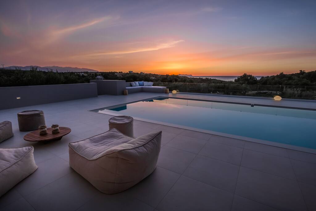Enjoy amazing sunsets in the lounge area next to the pool