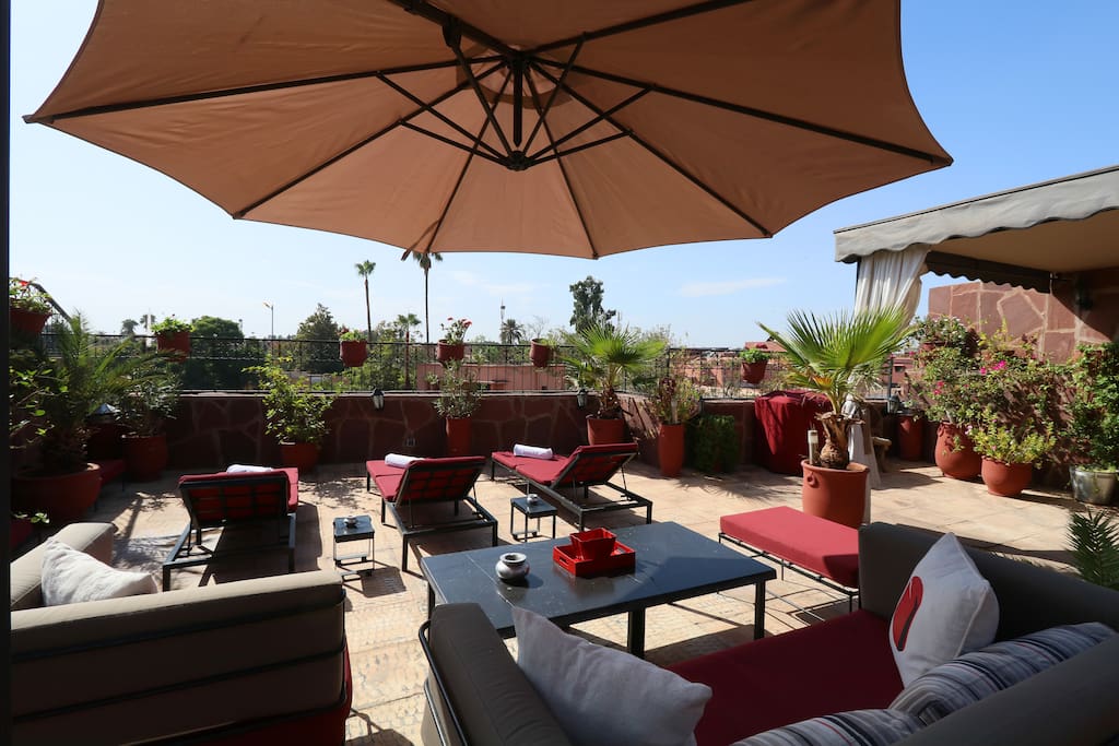 Our terrace... have a drink, nap on the bed or chat with friends!