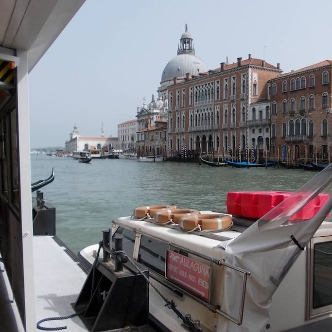 You can arrive directly from the airport San Marco in front of the Salute church you see in the picture! Boat stop 20 meters away!