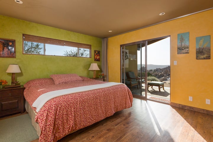 Main House Bedroom #1 with King Bed.  Back porch access and great sunrise views.
