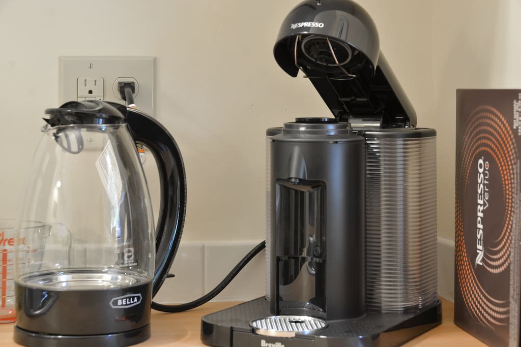Nespresso machine and tea kettle.