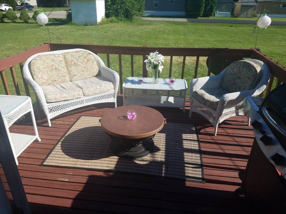 Lounging patio with fire pit and grill