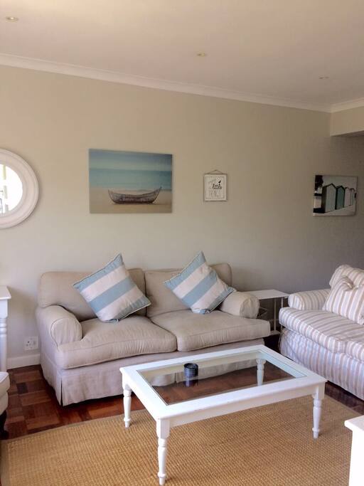 Spacious lounge and dining area with flat screen tv and DSTV.