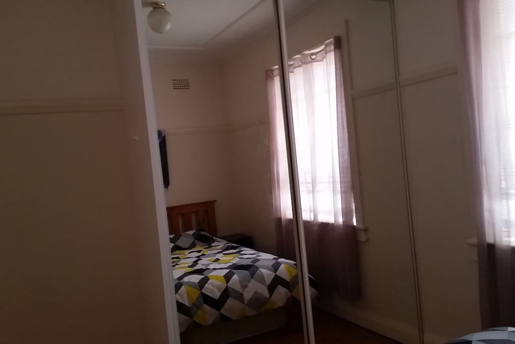 Bedroom with double built-in wardrobe