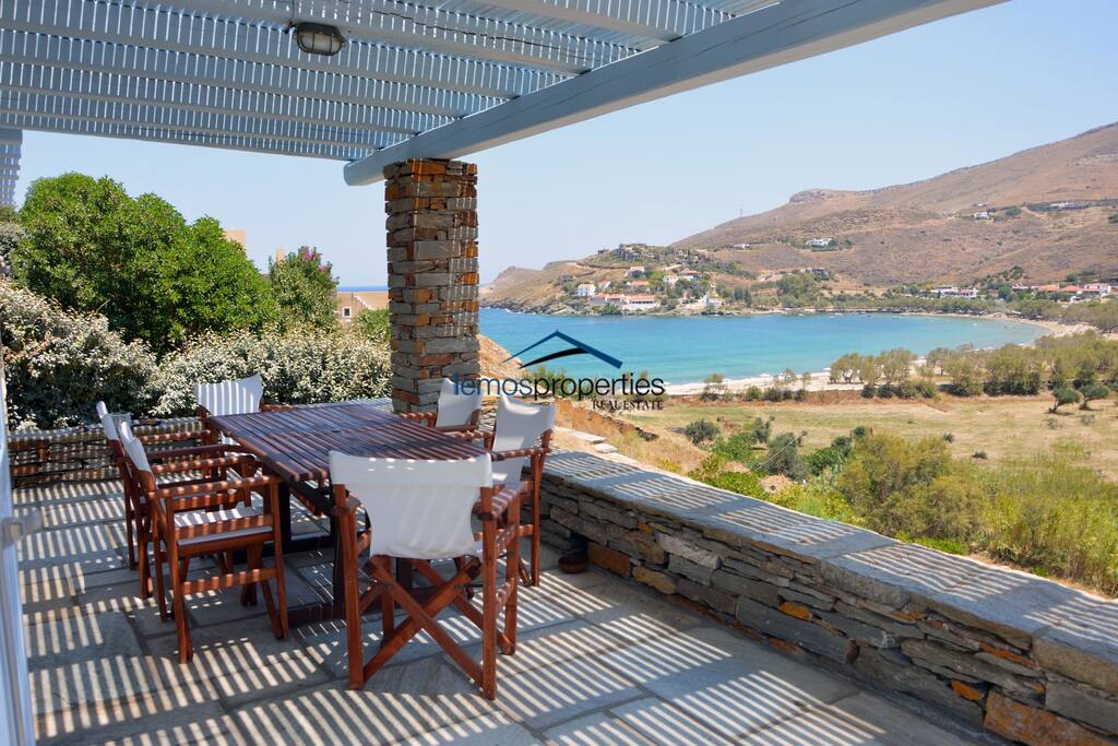 The shaded dining area with the sea view