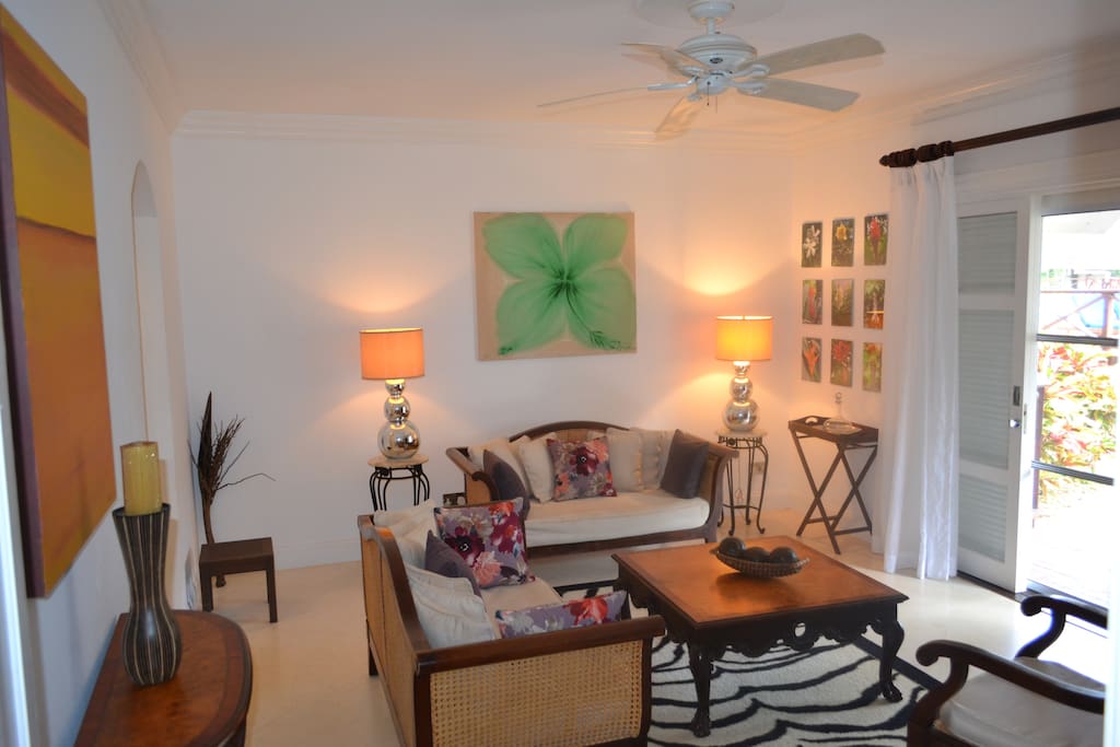 Unwind in the sitting room overlooking the private courtyard and pool