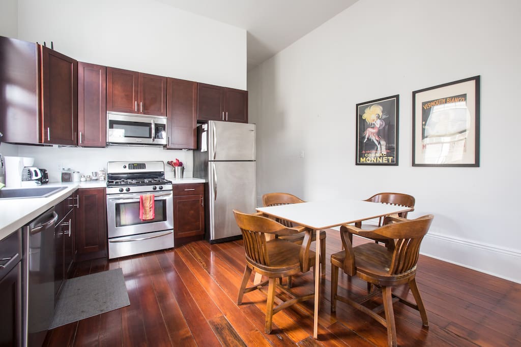 The kitchen is fully equipped and is open to the living room.
