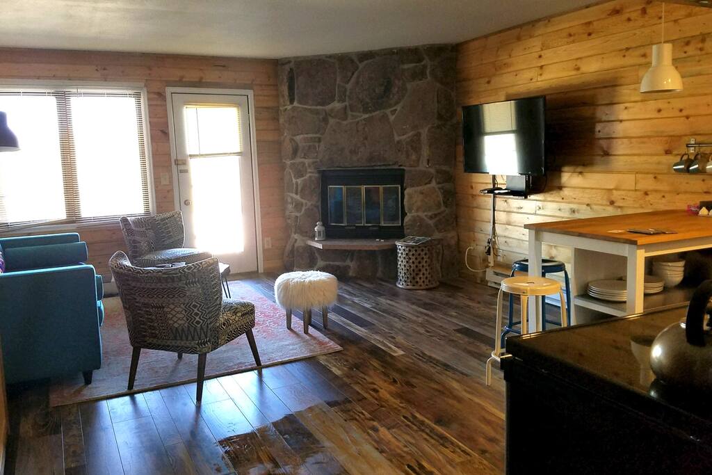 Full view of living room with fireplace