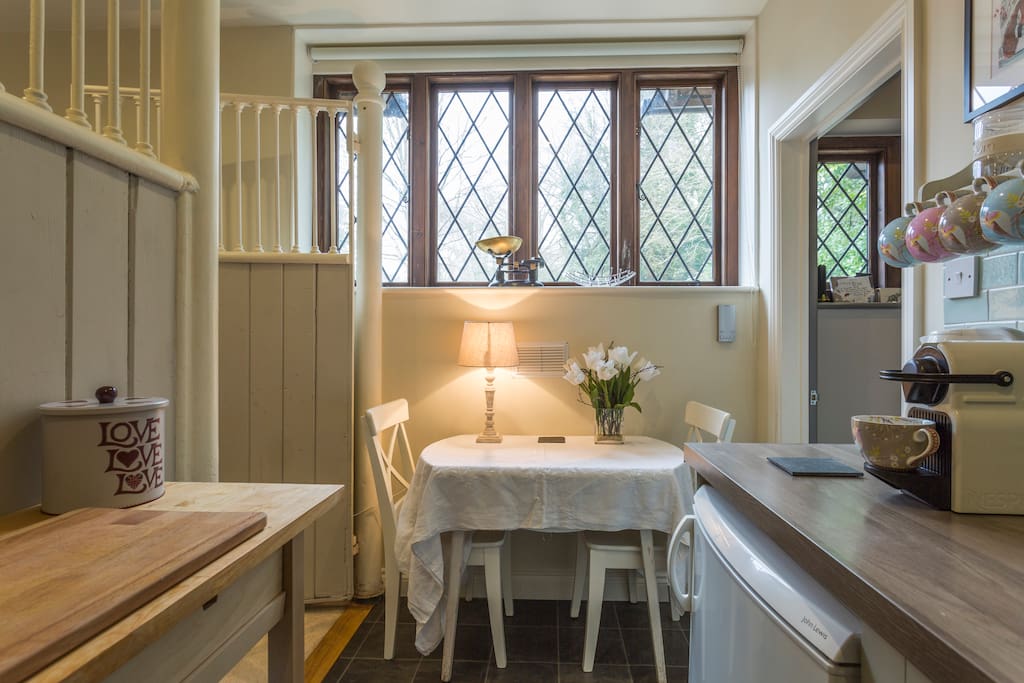 The kitchen is equipped with oven, microwave, kettle and Nespresso