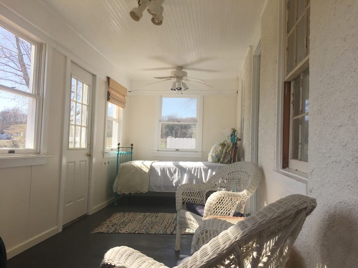 A sunny spot year round, the Sunporch View from the full bed end towards the single bed. This is the bedroom spaces on the first floor.