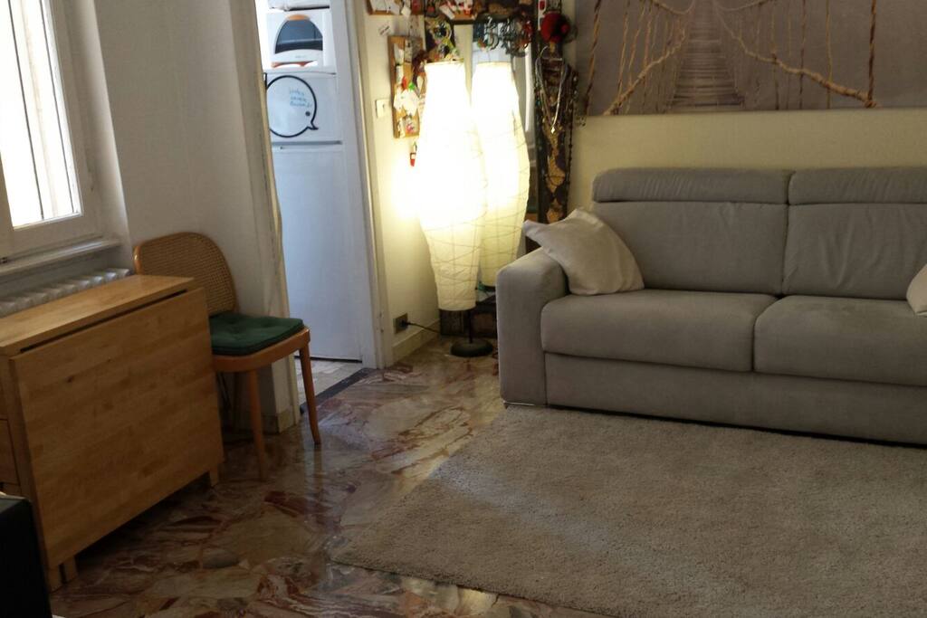 living room and the entry to the kitchen