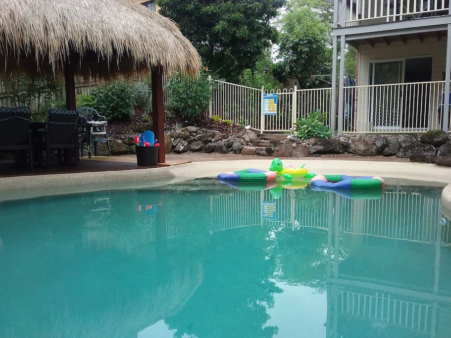 Easy access to the pool. Pool toys for fun. Fully fenced for safety. 8 seating dining under the cool Bali hut.