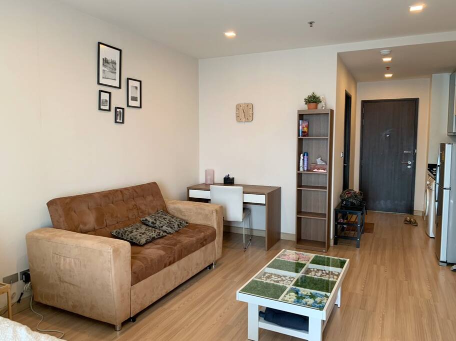 Living area. The sofa could be extended to sofa bed.