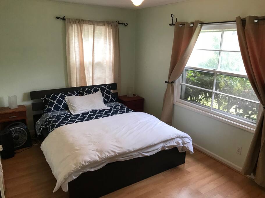 Main floor bedroom has a queen-sized posturepedic memory-foam bed. It's a very comfortable bed and there are large windows letting in the morning light.