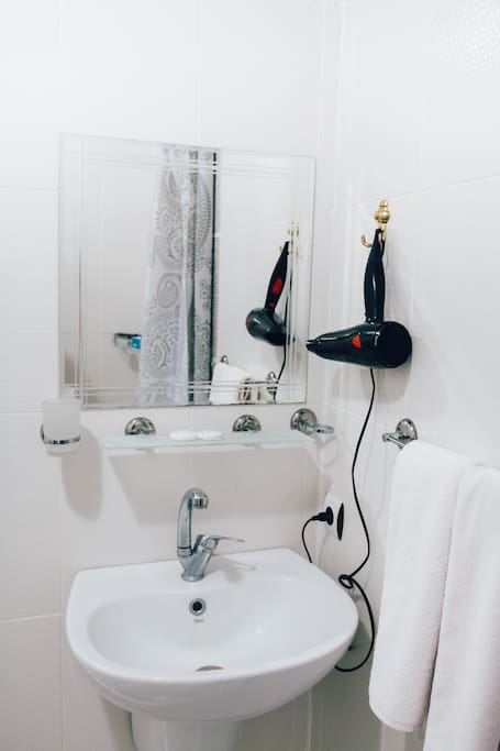 Your private bathroom includes a blow dryer, soaps and shampoos, and fresh towels.