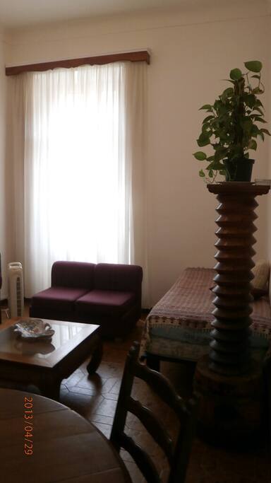 Big enough living with balcony with 4 meters high ceiling.