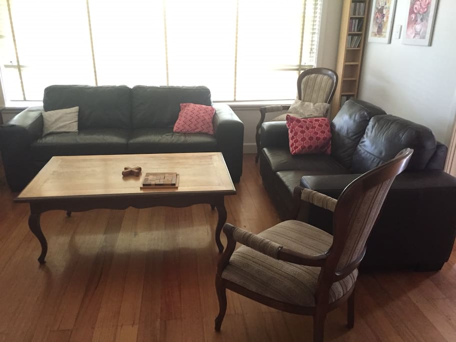 Living room, comfortable, plenty of light, gadgets and views