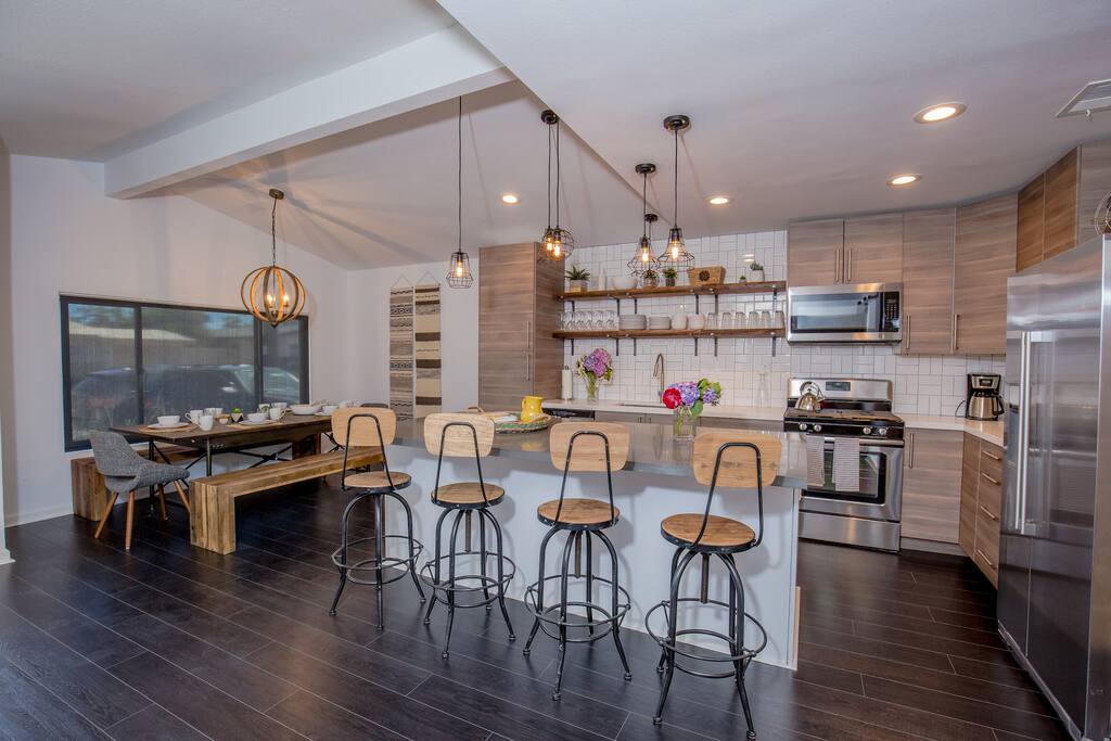 Cool Open Concept Kitchen with island and bar stools, all Brand NEW!