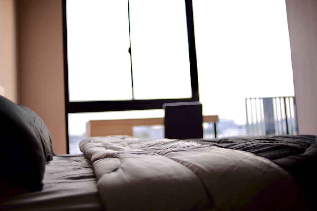 The cozy bedroom is ready for you and please enjoy staying in our room.