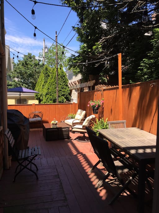 Private back deck w/SS grill, dining and sitting areas with fantastic outdoor lighting!