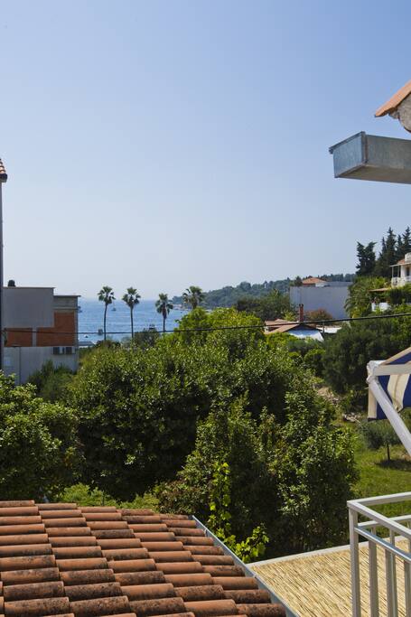 view from the terrace/the beach under the house