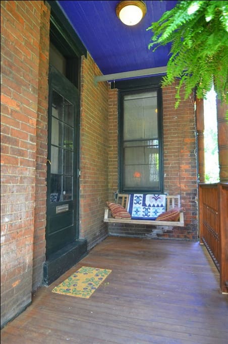 Covered front porch with swing