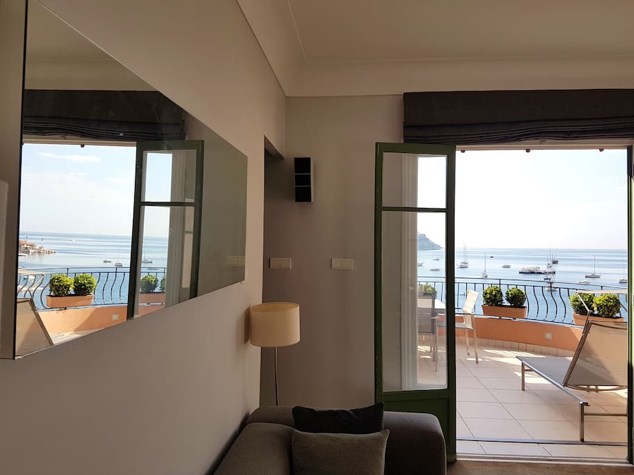 Living Area leading on to Terrace with Feature Mirror reflecting the beautiful views
