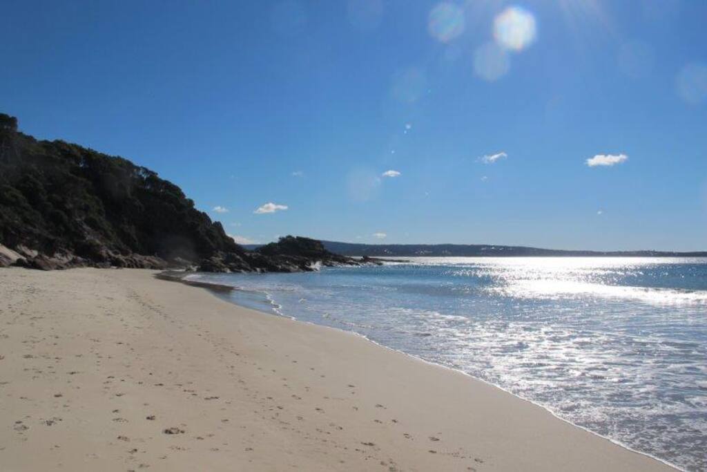 Beach in front of house