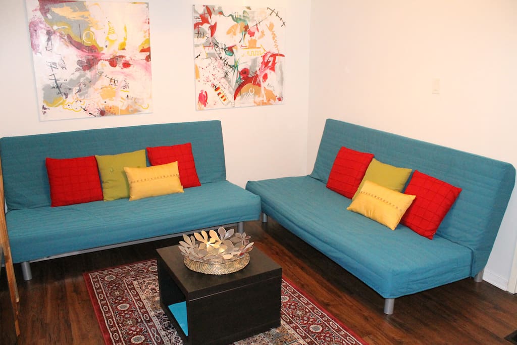 Spacious Living Room with Two Futon Sofa Beds