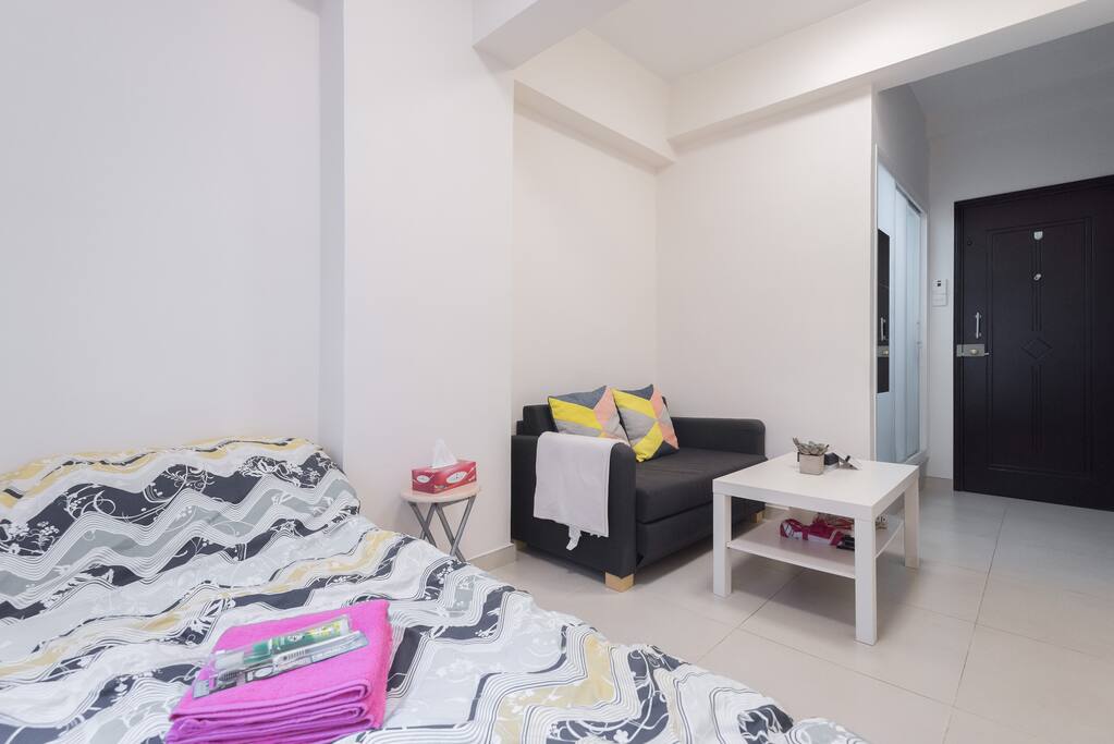 Comfy double sized bed for two will recharge you after a long day.