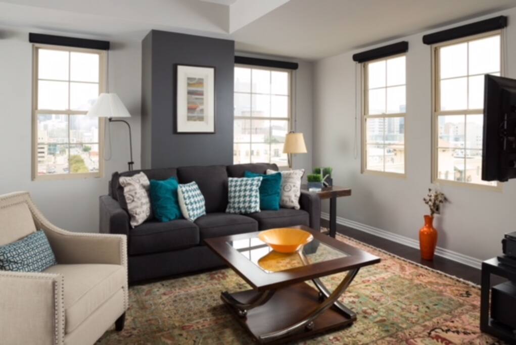 Relax and enjoy our open and spacious living area featuring a full sized sleeper sofa.