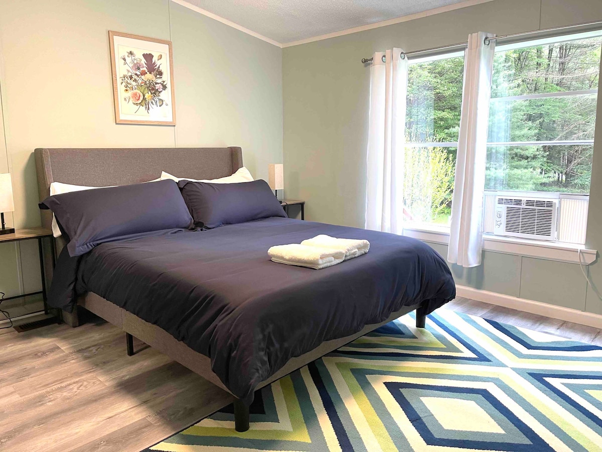 Bedroom with queen bed. 