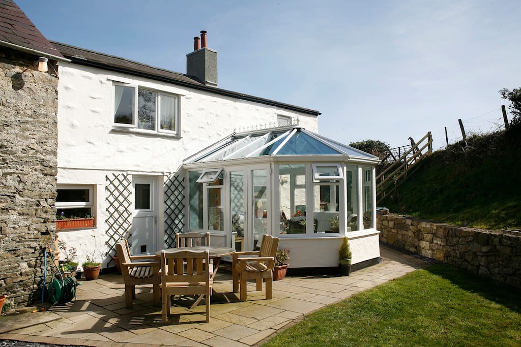 Enjoy sitting outside or play games in the large back garden.