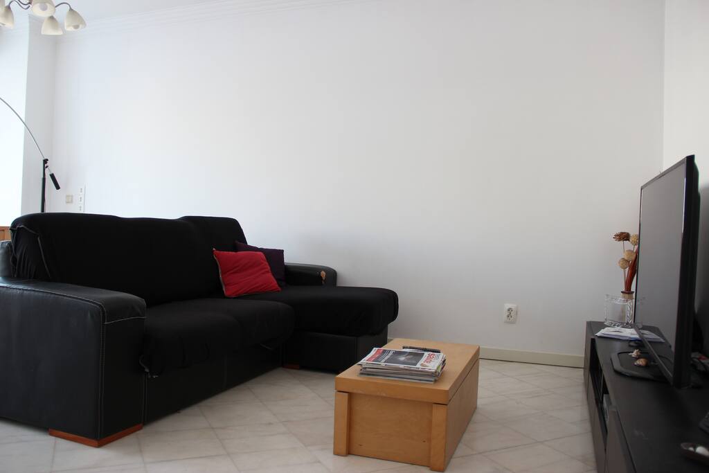Sala sofá e tv