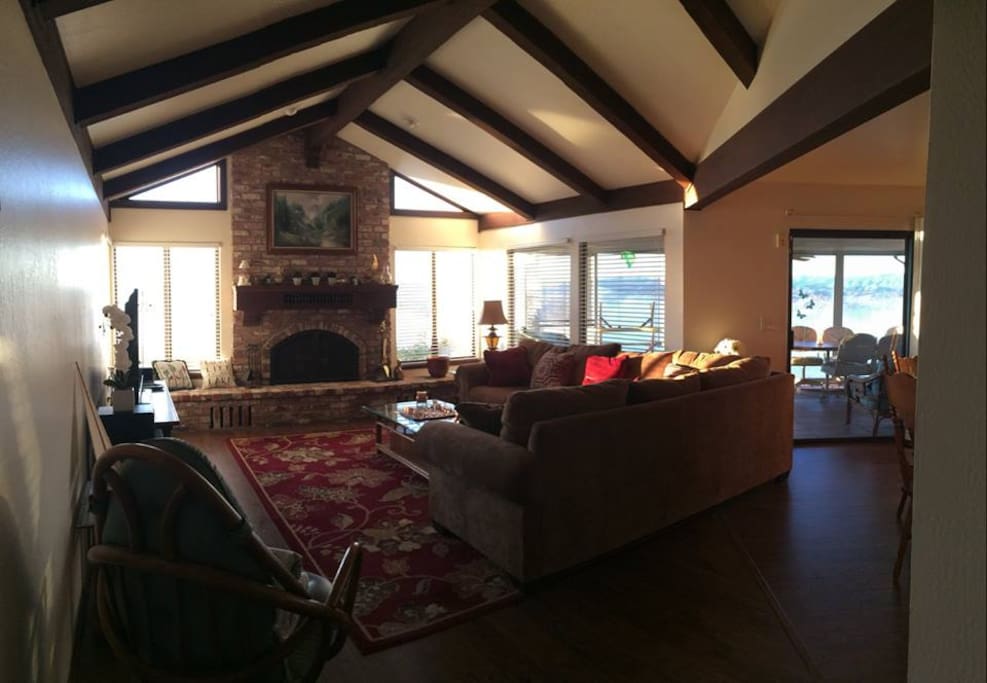 Large and comfortable sectional. Dining table seats 10. Enclosed sun-porch, dining for 15+, or sleeping.