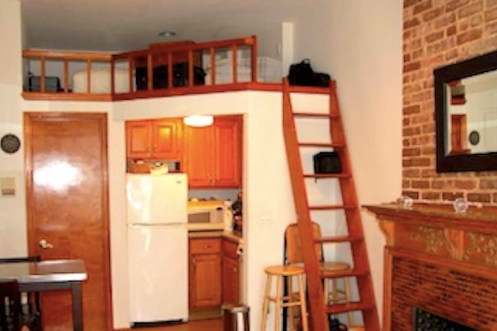 Lofted space above kitchen with air mattress, sleeps 2