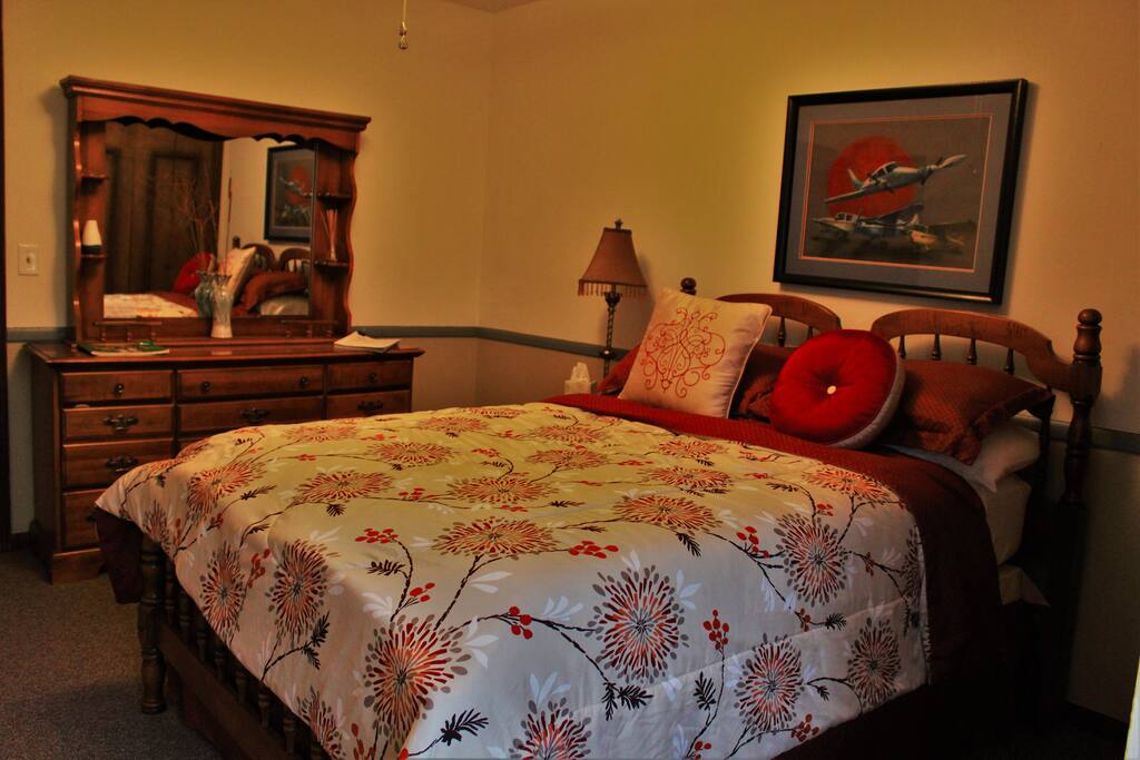 Your bedroom. This is a double bed, not a queen!